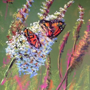 Butterflies resting on flowers in pastel