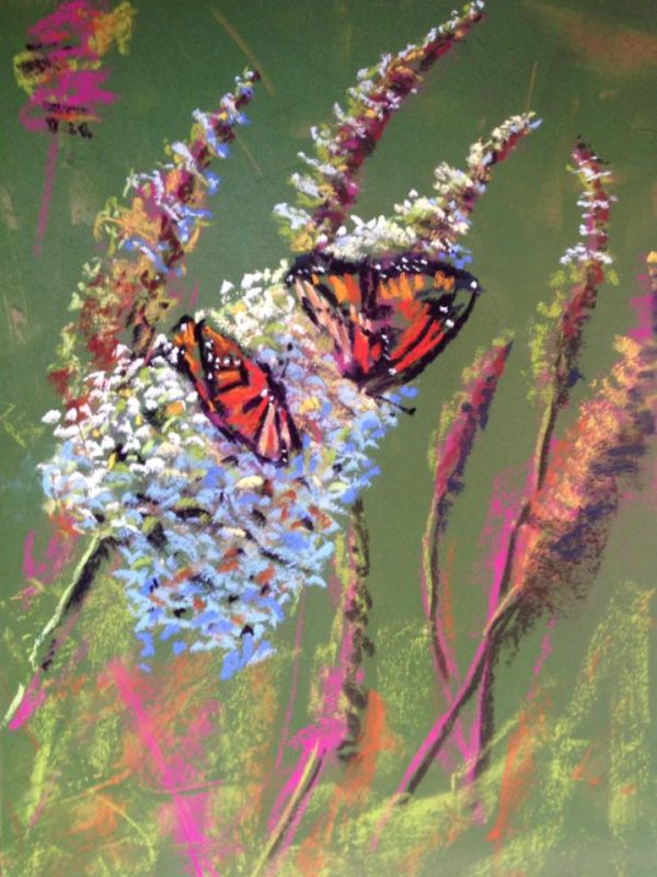 Butterflies resting on flowers in pastel